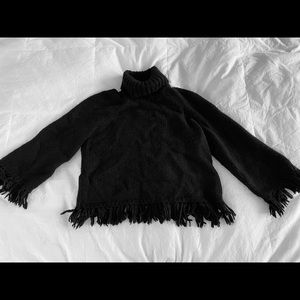 Turtleneck sweater with fringes
